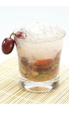 Grape Caipirinha - The Grape Caipirinha drink is made from cachaca, semi-sweet white wine, brown sugar, lime and grapes, and served in an old-fashioned glass.