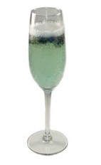 Hip New Year Cocktail - The Hip New Year cocktail is made from Hpnotiq liqueur, champagne and blueberries, and served in a chilled champagne flute.