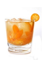 Kumquat Ginger Caipirinha - The Kumquat Ginger Caipirinha drink is made from cachaca, kumquat, sugar and grated ginger, and served in an old-fashioned glass.