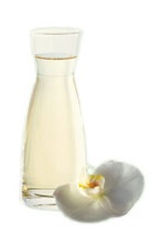 Sake Blossom - The Sake Blossom is made by heating sake and St-Germain elderflower liqueur, and served in a shot glass.