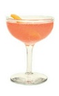 The Nomayo cocktail is made from gin, St-Germain elderflower liqueur, Aperol, lemon juice and champagne, and served in a chilled cocktail glass.