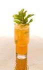 The Pineapple Passion Mojito drink is made from cachaca, passionfruit, lemon-lime soda, pineapple, lime and mint leaves, and served in a highball glass.
