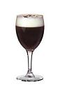 The Saint Brendans Irish Coffee drink is made from Irish Cream (Saint Brendan's) and fresh coffee, and served in a white wine glass.